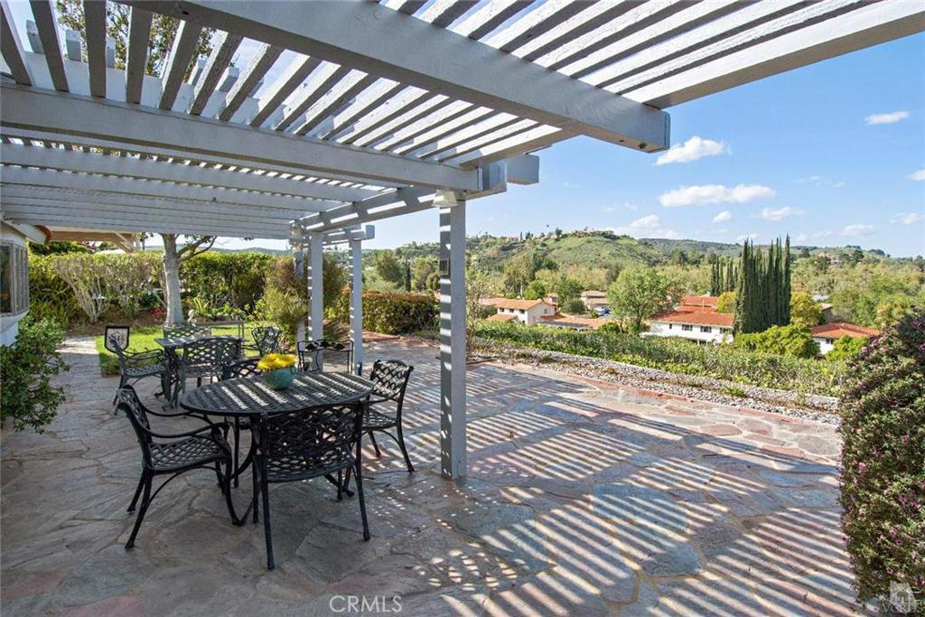 Incredible Single Story with Amazing Views! Southshore Hills with 4 bed/2 bath 2040 sq foot home on 14,075 sf lot. Beautiful, lush garden walkway as you approach this bright and welcoming home. Double entry doors lead into marble tiled foyer with vaulted ceilings. Living room with hardwood floors and gas fireplace with large windows that bring in an abundance of light. Formal dining room is off the kitchen for easy entertaining. Kitchen features granite counters, tile backsplash and impressive views. Family room has wet bar and double patio doors that lead to the fabulous outdoor living space. Master Suite has vaulted ceilings with 5 panel bay window of the views and private bath with travertine floors with a beveled glass door leading to the backyard patio. Entertainer's backyard includes