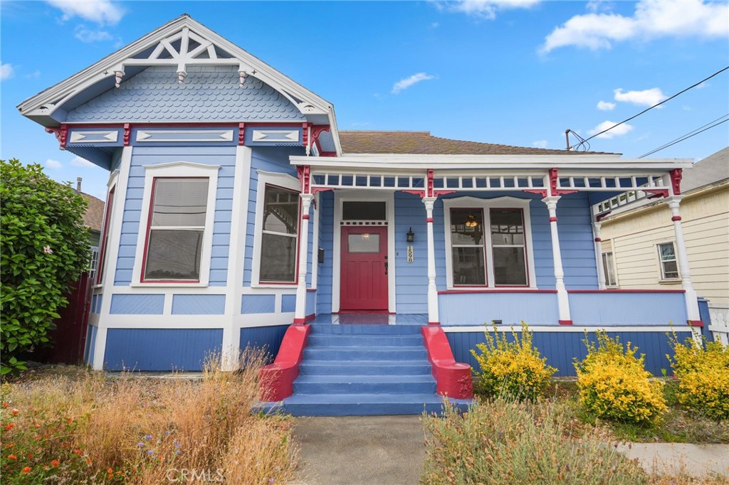 Welcome to 1598 W. 36th Place — Step into a piece of Los Angeles history with this stunning 3-bedroom, 2-bath Queen Anne/Eastlake Victorian gem, built in 1892 and once owned by Col. J.J. Warner, a pioneering figure in California’s early days. Nestled in the heart of the sought-after Jefferson Park neighborhood, this home is the perfect blend of classic charm and urban convenience. As you enter you will notice the grand foyer with high ceilings, built-in custom benches and gleaming laminate wood flooring throughout the home’s open, airy layout. The large living room with large windows, built in media center, along with a formal dining room with fireplace is perfect for entertaining guests. The Gourmet kitchen is highlighted with Quartz countertops, custom grey cabinets, white farm house sink and stainless-steel appliances. 3 Bedrooms that includes a primary suite featuring a large walk-in shower and separate soaking tub. Relax, unwind, or entertain guests in your beautiful backyard featuring fruit tree, herb garden bed and enough space for those summer bbq’s. Other features include laundry area inside (washer and dryer included, fresh paint, recently installed HVAC with ducting and 2 car carport. Located just minutes from USC, Downtown LA, Hollywood, Mid-Wilshire, and with easy access to the beach cities. Whether you're looking for a charming residence or an investment with historic appeal, this home is a must-see.Don't miss your chance to own a piece of LA history! Property has been Virtually Staged.