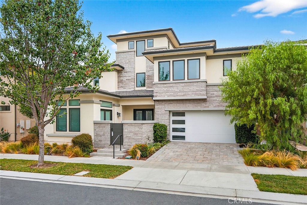 MUST SEE!!! A Luxury Model home located in 24 hours gate community Altair at Irvine , fully furnished by Builder Lennar famous design team, total decorated with 4 Beds , 4baths +2 half bath +den+loft+bonus room. A bedroom suit at downstairs with private entrance ,living room ,bathroom ,washer and dryer .Many upgrade items inside including Wood Floor, Carpet, Kitchen Counter Top,Back Slash, Bathroom Shower ,Tile and so on. Luxury Master bedroom with full upgrade master bathroom, walk-in closets. Electric Curtain at living room , office ,all bedrooms. Biggest entertaining room as third room with deck. Speaker System was installed in whole home. This home has very beautiful landscaping including BBQ and Water Fountain ,private interior yard and back yard. Walking distance to Portola High School.