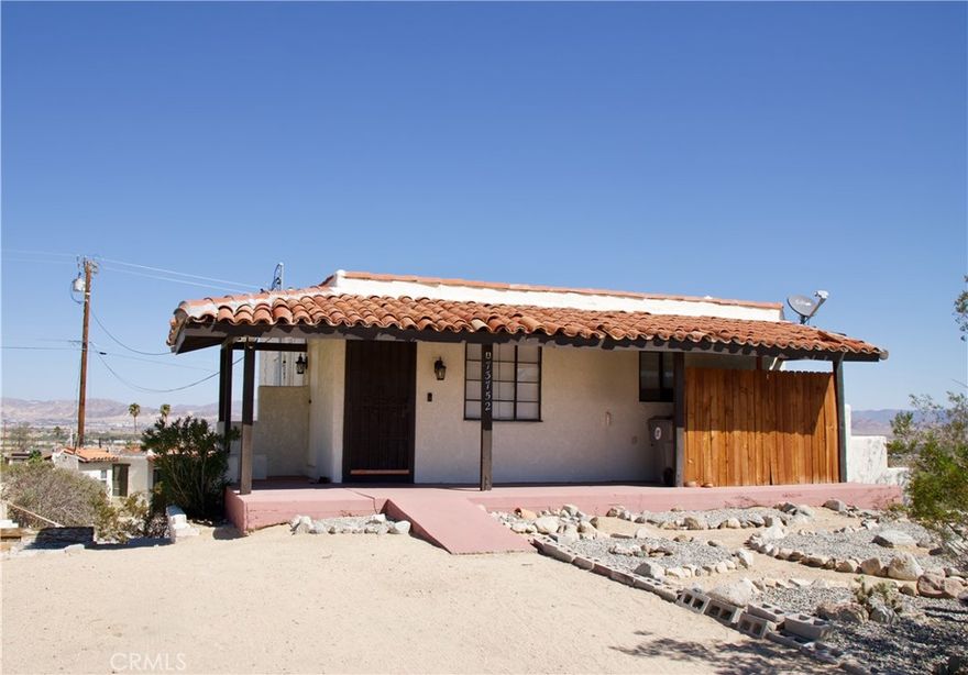 FANTASTIC CASH FLOW OPPORTUNITY!! Charming Spanish style TRIPLEX, nestled in the heart of Twentynine Palms! Each unit features its own private outdoor patio, individual parking space(s), separate meters, contemporary finishes, and walls/split units for heating and cooling comfort all year-round. UNIT A, top floor, is a 2 bed, 1 bath; it provides a nice-size kitchen with lots of cabinets, a walk-in closet, carpeted bedrooms, and amazing views from its private balcony. UNIT B, bottom floor, includes Saltillo tile floors, a cozy kitchen, a dining area, along with partitioned sleeping quarters, a small bath, and a covered patio. UNIT C is a detached “Casita,” with a studio layout, a sectioned kitchen area, a lovely bath, and an outdoor private swing. The property also comes with a detached garage that can be leased out separately as storage, if desired. The shared area is perfect for barbecues and gatherings, a perfect blend of amenities and serene living. Located steps away from downtown, a few miles from Joshua Tree National Park, and the Marine Corps Base.