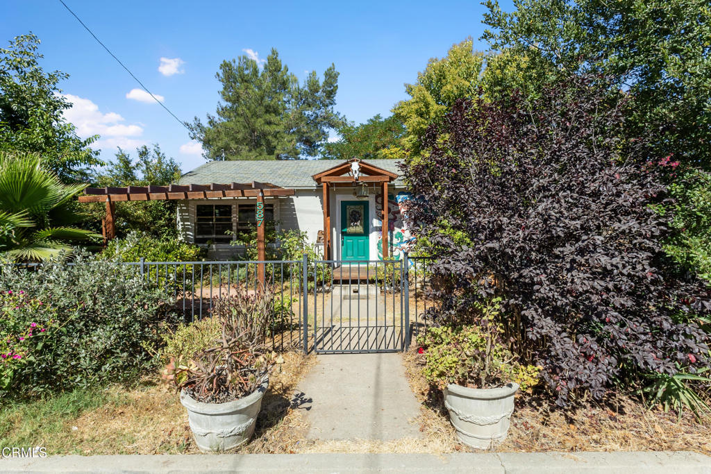 Located in the heart of Oak View at 587 Vine St is a single story 3 bedroom, 2 bath home with approximately 1,170 sqft living space on almost 7,000 sqft lot. This home is has been a local artist retreat, however now is the chance for you to make it your own! Property includes a 1966 Airstream Sovereign Land Yacht, exterior shower with electric water heater and numerous fruit trees, such as Lemon, Meyer Lemon, Peach, Avocado, Grapefruit, Tangerine, and Kumquat! Close proximity to Ojai Valley Ranch Market, KJ donuts and Lovewell tea/coffee.