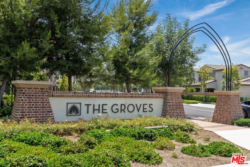 Welcome to The Groves, a Lennar Homes Luxury Community built in 2020 with tree-lined streets and resort style amenities. This Harmony Collection contemporary home located inside quiet cul-de-sac offers a generous 5BR, 4BA floor plan with 2,299 sq ft which stays light and bright all day. The main level opens to a great room concept combining your large living room, dining room area and kitchen with large island. Your Chef's cook kitchen is equipped with top-of-the line stainless steel appliances including gas stove top, oven, microwave, beautiful shaker cabinets and quartz counter tops. The 1st Floor includes 1 bedroom, 1 bath perfect for guests or in-laws. The 2nd floor features an oversized primary bedroom with expansive bathroom including soaking tub, separate shower, dual sinks and walk-in closet, plus additional 3 guest bedrooms, one of which is en-suite with its own bathroom and closet. Outdoor over-sized open patio perfect for entertaining and dining al fresco under modern string lighting. The property includes tankless water heater, solar panels which produce enough energy leaving you with mostly $0 or negative utility bill, large 2-car garage with epoxy flooring is prewired for EV charging station and shelving racks for extra storage, plus 2 additional driveway spaces. The HOA 11,000 sq ft Club House amenities includes 2 swimming pools, one with shallow beach-style entry, hot tub, playground, gym, meeting rooms, gathering areas, bocce ball court, dog park, putting green, large banquet hall with private event spaces and well-equipped kitchen that can be rented for formal or intimate events. Close proximity to Uptown Whittier, excellent schools with one of our state's most high-tech learning environments, short distance or drive to grocery, retail shopping, dining and gym, or use the newly City of Whittier People Mover which has pickup areas inside The Groves giving you rides to nearby establishments. Come live a Lifestyle like no other.