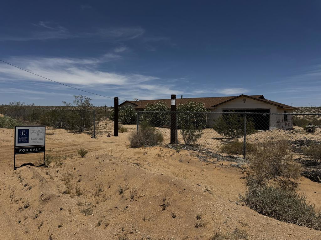 Investor Special!Looking for your next project? This is it! Nestled on 5 flat, usable acres in sought-after Joshua Tree, this 3-bedroom, 2-bath home comes with a bonus small cabin and panoramic desert views. The property is a true fixer-upper--it needs a full gut renovation and significant repairs (including holes in walls) which is reflected in the price--this property offers incredible potential for the right buyer.With a recently remodeled short-term rental just across the street, this location shows strong promise for future return. Whether you're looking to flip, rent, or build your dream desert retreat, this is a prime opportunity.Buyer to verify all aspects of the property, including electrical, plumbing, and overall condition.