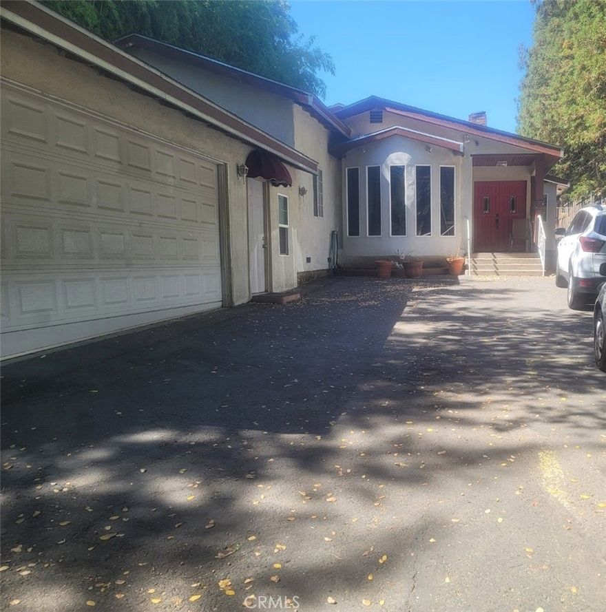 This property has seller Financing considered with 35% + down payment. Main House -3Br / 2Ba house ~2350 sf. plus 2 rentals. ( House, Jr. ADU and Pool house).  Main house has many custom features. Huge bathroom & walk through closet in primary suite.  High ceilings in living room and adjacent family room with bar counter.  Large Lot with remote gated front entry, RV and extra parking spaces and In-ground pool.  Also flat rear lot approximately 53' x 200' ready for development "by right" with ADU 1200 sf or more or other allowable desired uses. Multi-generational families enjoy the layout.  Bring your ideas for this rare Owner User Investor opportunity. Currently PERMITTTED for Short Term Rental (STR).