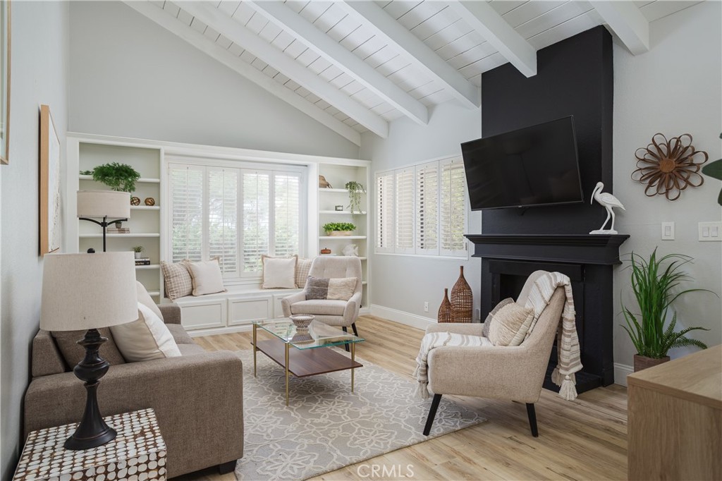 Welcome to 9 Sandflower Ct. in vibrant community of Newport Terrace. Not too often does the opportunity to own a highly desirable end unit that truly feels like your very own. This private single level end unit sits at the edge of the community directly across from Canyon Park and Talbert Nature Preserve. You are just steps away from beautiful tree lined trails in the nature preserve that provides direct access to walking trails, bike paths, outdoor activities and the Santa Ana River Trail leading directly to the beach with access to Newport Beach to the South and Huntington Beach to the North.
This 2 bedroom, 2 bathroom condo with an enclosed courtyard just off the private 1 car garage has been fully remodeled and beautifully designed with upgraded bathrooms, kitchens, and flooring. As you enter the main living area you are greeted with spacious high vaulted ceilings and a bright open space. For those seeking relaxation and recreation the community features pools, a spa, basketball courts, and private outdoor seating areas.
The condo features two spacious bedrooms and two fully renovated bathrooms, providing a fresh and contemporary feel. Including a bright and airy windowed kitchen, this home is designed to accommodate a variety of lifestyles. The kitchen is outfitted with a gas oven, gas stove, refrigerator, and dishwasher, making meal preparation a pleasure. The convenience of an in-unit washer and dryer further enhances the ease of living. For those seeking relaxation and recreation, the communal pool and common hot tub are ideal spots to unwind. Enjoy the luxury of a private patio, perfect for outdoor dining or simply soaking up the California sun.