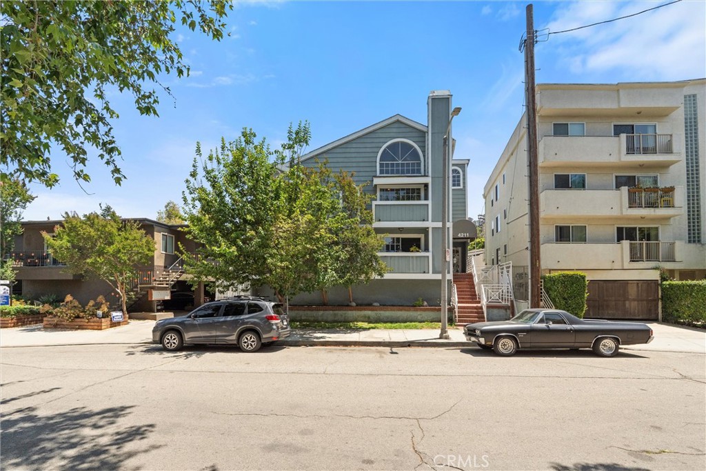 Modern 2-Bedroom Condo with Loft, Fireplace & 3 Balconies in Prime Studio City. Welcome to this bright and stylish 2-bedroom, 2-bathroom condo featuring a large loft and three private balconies, situated just off Ventura Blvd in Studio City. This approximately 1,020 sq?ft corner unit combines comfort, charm, and convenience—perfect for modern living due to the close proximity of everything Ventura Blvd has to offer. This open-concept living area boasts soaring ceilings, a gas fireplace, and abundant natural light streaming through large windows. A spacious loft offers versatile space for a home office, studio, or guest retreat. The primary bedroom includes an en-suite bath and walk-in closet, with an additional second bedroom with a full bath just outside.
Highlights:
Three private balconies ideal for indoor-outdoor living
Cozy fireplace & expansive living space
Flexible loft overlooking the main floor
Primary suite with walk-in closet
In-building laundry and central HVAC
Two assigned gated parking spaces with storage
Secured, low-rise building on a quiet, tree-lined street
Unbeatable Location:
Short walk to Sushi Row, Ventura Blvd’s top restaurants, cafés, & boutique shopping
Nearby access to Marshall’s, Michaels, groceries & daily essentials
Excellent freeway and studio access—ideal for professionals and creatives
Top-Rated Schools & District:
Located in the Los Angeles Unified School District
Just 0.5 mi to Rio Vista Elementary
1 mi to Walter Reed Middle School
1.8 mi to North Hollywood High
This condo offers a rare combination of space, style, and close proximity to Ventura BLVD in Studio City.