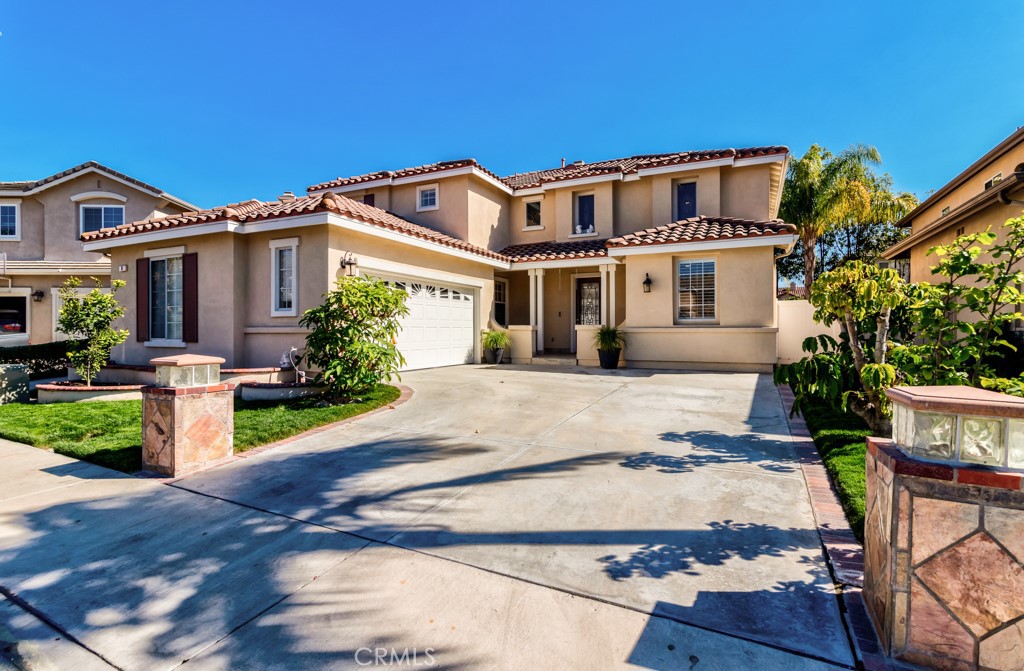 This luxurious residence is a single-family detached house and is in the much-desired gated community of Oak Creek, Irvine. This highly upgraded home, with custom interior finishes, is flooded with natural light. The customized front door opens to a stunning formal entry. Downstairs features one bedroom, a formal living room, a formal dining room, and a great family room with a fireplace. A tastefully designed kitchen is adorned with a center island seating, modern double-oven gas stove, farmhouse sink, drawer microwave, and granite stone countertops. All cabinets are custom-made and have some glass and mirror inserted upgrades. The Kitchen also includes an additional dining room area! Upgraded shutters, stained glass windows, and designer chandeliers. Inside, laundry rooms, a two-car garage, extra-long driveway. Backyard paradise! Enjoy a state-of-the-art BBQ island, fire pit, patio cover, and fruit trees! Bedroom 4 upstairs is a multi-functional room that can be used as an office, bedroom, or game room. The master bedroom features high ceilings and a huge walk-in closet. Both bathrooms are designed with Carrara marble countertops, dual sinks, a luxury shower, and a bathtub in the owner's suite. The community boasts an 11-acre park, two swimming pools, a tennis court, a basketball court, a volleyball court, a clubhouse, and a spa. Easy access and close proximity to the 405 freeway, Oak Creek Elementary School, Irvine Spectrum Shopping Center.