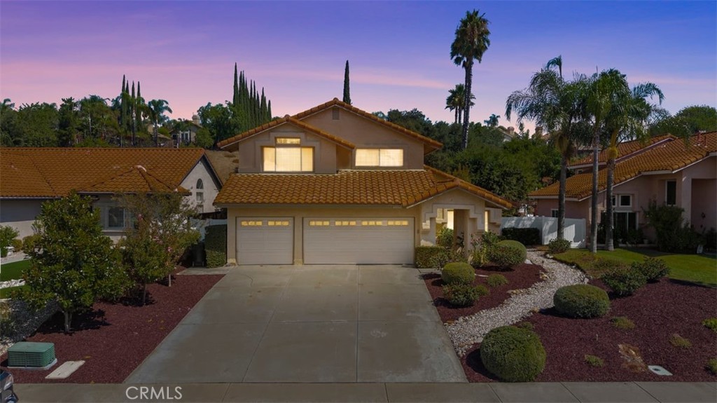 Welcome Home! This spacious 5-bedroom, 3-bathroom Temecula home, perfectly situated on a premium 13,000+ sq ft lot in a highly desirable neighborhood—with no HOA and just minutes from Temecula’s award-winning wineries, top-rated schools, shopping, and dining.
This beautifully designed home features a grand formal entry, elegant staircase, formal living and dining areas with a picture window, and a chef’s kitchen complete with granite countertops, center island, and ample cabinet space—opens to the family room that features tile flooring, a wet bar and a cozy fireplace. The large windows offers serene views of the peaceful backyard and covered patio, ideal for entertaining or relaxing.
The floor plan includes**** one bedroom and full bath on the main level, perfect for guests or multi-generational living ***and a individual laundry room. Upstairs you’ll find four additional bedrooms. The spacious master bedroom has double door entry and plenty of room to enjoy, the master bathroom features a walk in closets and dual sinks with a upgraded shower and separate tub- perfect to relax in. Additional highlights include upgraded flooring throughout, new vinyl fencing, 3-car garage, and a rare, oversized lot offering endless possibilities. With its generous layout, prime location, and tranquil setting, this home checks every box!