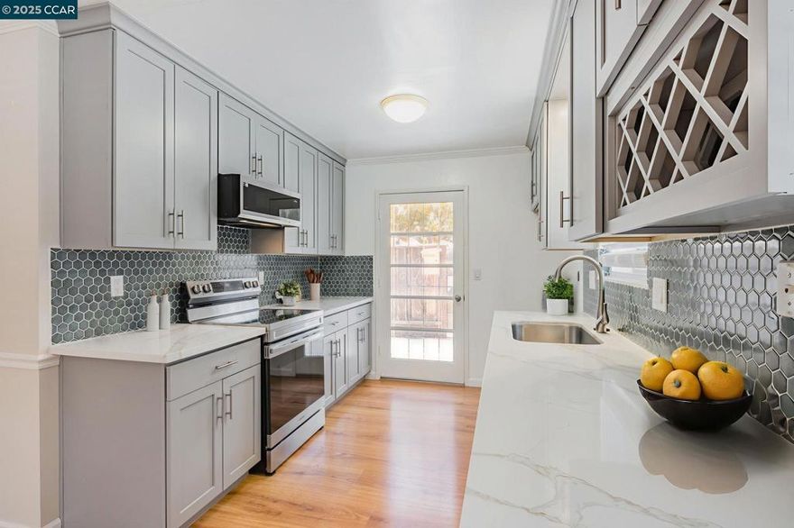 Are you ready for the heat of summer? Don't worry, this beauty includes central AC! Discover an incredible opportunity to own a beautifully maintained home in the heart of Fremont! This single-level, end-unit townhouse offers 2 bedrooms and 1 bathroom within a generous 900 square feet of living space. Recently remodeled kitchen and bath. Stunning kitchen with stainless appliances, gorgeous counters and back splash. Recessed lighting throughout. Crown molding, and decorative chair rail, add to the charm. Central heat and air. Convenient indoor laundry. Dual pane windows. Private back patio with artificial turf and extra storage. 2 convenient parking spots just steps away. Centrally located to all the amazing Fremont amenities including walking distance to schools, shopping, dining and recreation! Close to BART and easy commute access to everywhere! Lovely complex with access to RV/Boat storage on site.
