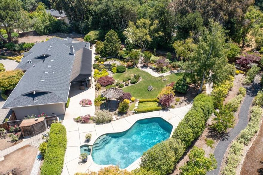 Outstanding Opportunity in Central Atherton! Located at the end of a cul-de-sac in central Atherton, this property offers an exceptional opportunity  move in and enjoy the home today, transform into your dream vision, or consider building new. The sprawling ranch home on over one acre of level, sun-swept land features numerous updates, hardwood floors, and picture windows looking out to remarkable gardens. The Zen-inspired setting includes two koi ponds, a pool and spa, gazebo, walking paths through manicured gardens, and separately fenced side yards. The homes close-in location is just one mile from the new Atherton community center and library and two miles from downtown Menlo Park.