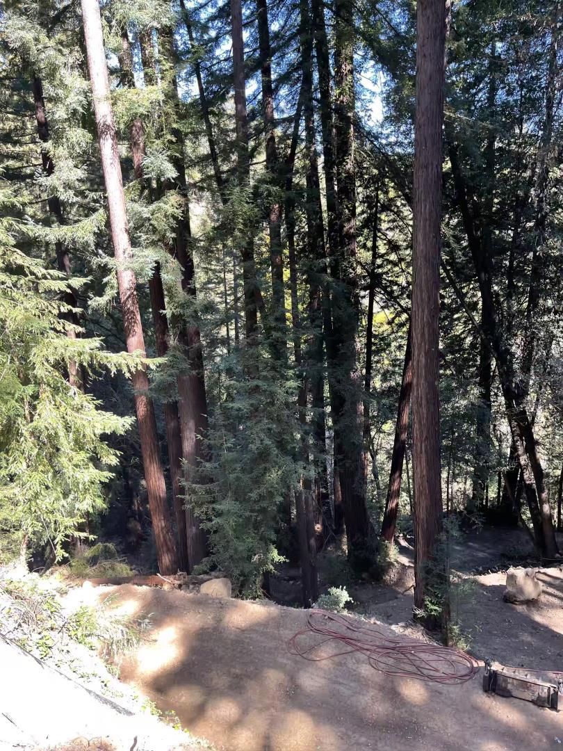 HUGE $110K PRICE REDUCTION! Looking for 3 lots for the price of 1 AND only 10 MINUTES DRIVE TO DOWNTOWN LOS GATOS? You found it! Sub-divided lots adjacent to each other with water and power on lot A ready to go. Together they add up to over an Acre of Land (3 lots add up to approx 1.14 acres ) - once graded the build Potential is Huge (OWNER IS CURRENTLY PUTTING ALL THE BUILD REQUIREMENTS IN PLACE)- Room for a Home and ADU for extended family or Extra Income. Tranquil location that leads to a bubbling creek, Build your own Oasis in the Redwoods - Close enough to Downtown including Shopping, Restaurants and easy access to Highways 85, 280 and 101. Coveted LOS GATOS SCHOOLS including LOS GATOS HIGH! Call Now for more details and to Arrange an Appointment to view.