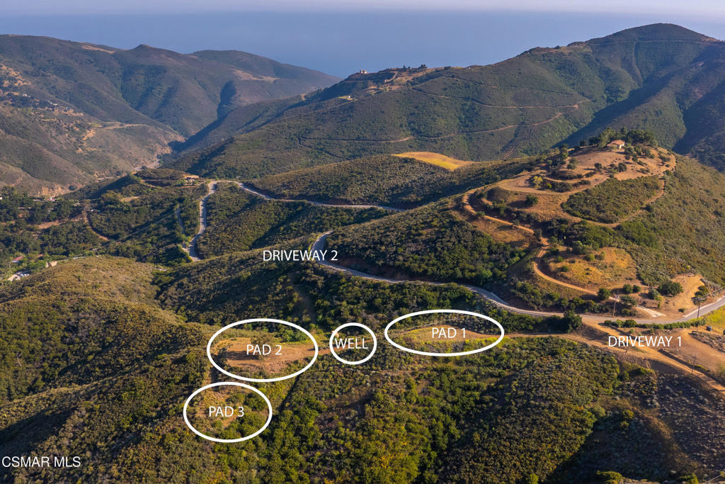 Sweeping ocean, canyon, and mountain views await on this rare 13+ acre parcel nestled beneath Malibu's iconic Boney Ridge. Tucked into the serene landscape of the Santa Monica Mountains, this property offers privacy and tranquility. Striking red rock formations evoke the beauty of Sedona, while rolling hills come alive with lush grass and wildflowers in the winter and spring.Whether you're envisioning a private estate, custom ranch, or multi-structure compound, the possibilities are endless. The property features three building pads, dual driveways, and access to hiking and riding trails. A water well is on-site and conveniently located. This secluded retreat offers the best of both worlds--privacy and convenient access. Just 10 minutes from the sand and surf at County Line Beach, the property is also within easy reach of Westlake Village, Camarillo, Ventura, and Los Angeles. Rarely does a property of this scale, beauty, and potential become available--an ideal canvas for a legacy estate in the heart of Western Malibu.