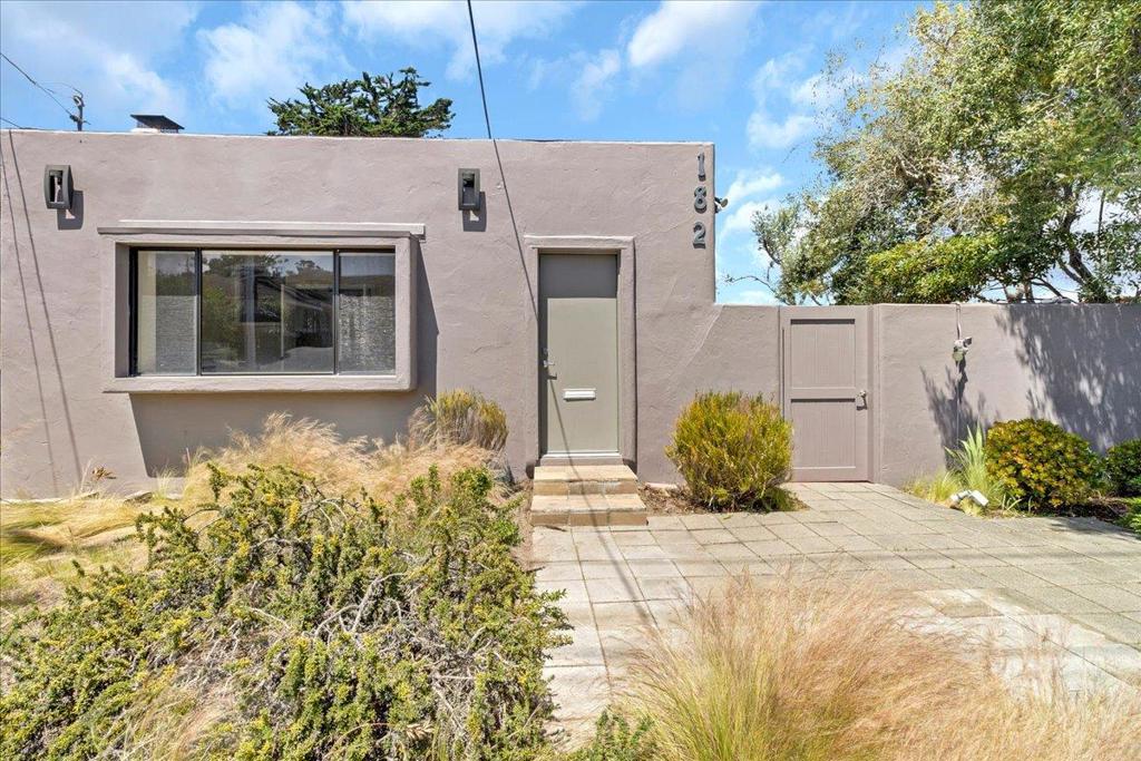 Discover a rare opportunity to purchase a charming, freestanding professional office building, perfectly suited for medical or professional practices, with the unique potential for conversion back to a stunning residential home. Located in a highly visible area, this Monterey-style property combines historic elegance with modern updates, offering a versatile and inviting space for your business or investment needs. Current use is as a commercial office, Seller designed plans for a 2 car garage and also for a 2 car garage with an ADU. Plans will be included with the Sale. The city allows the conversion to residential, please contact agent and city for more details.