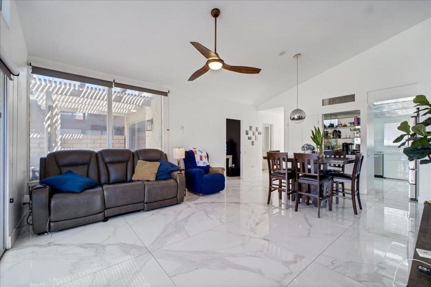 Located within the prestigious Indian Palms Golf Country Club. It's boasting a stunning contemporary design. This Condo features 2 bedrooms and one full bathroom. It's located directly across from the Clubhouse and just steps away from the fitness Center! The kitchen boast sleek, bright modern white cabinetry, complemented by a stylist backsplash and gorgeous quartz countertops. The Bathroom includes marble shower with rain shower head and a nice vanity. Enjoy the sophisticated expense of the stunning 48X48 polished flooring, modern light fixtures and ceiling fans! Close to the Main Entrance and Coachella Fest Fairgrounds. The rear patio offers panoramic vistas of Mountain scenery and a greenbelt. Amazing opportunity for rental income from Coachella Festival, Stage Coach and many other events in the Coachella Valley! Near Casinos, Restaurants and Shopping Stores.