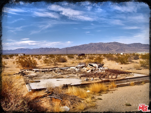 CATHERINE ROAD: This nice 5 ACRE piece of land is 2nd lot from Corner of Barbara Lane & Catherine AKA: Nevin Rd. Dimensions = 333 X 659 = 5 Acres. The electric is there in the street and land is ready to build. Large cement pad on land towards the rear. Nice views of mountain ranges and perfect for a horse ranch. Owner will Carry with 20% down $960.00 1st Trust Deed of $ 3840.00 @ 7% amortized over 5 years payable $76.04 monthly + $10 monthly service fee. APN0625-331-27-000
