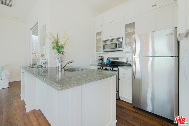 MALIBLU - REDUCED TO SELL! This quintessential Malibu Road Beach house is on approx.75' beach frontage. First time on the market in 31 years. Step through gated entry into a lush tropical walled courtyard surrounded by mature trees, succulents and flowers with approximately 39' long heated swimming pool, ocean view spa and built in BBQ. Spectacular ocean facing open plan living area with high ceilings, walls of glass and big wide ocean views with Catalina center stage in the distance. Entire home sits out from the home to the east allowing expansive vistas of the colony and entire east bay. Master bed and bath sit ocean side. A wide dramatic deck wraps around the entire home for entertaining. Bedrooms 2&3 are both en suite with ocean views. Private gate and stairs to beach.1 bed/1 bath/kit private guesthouse sits above the garage with expansive views and private deck. Buyer to verify any and all measurements and square footage.