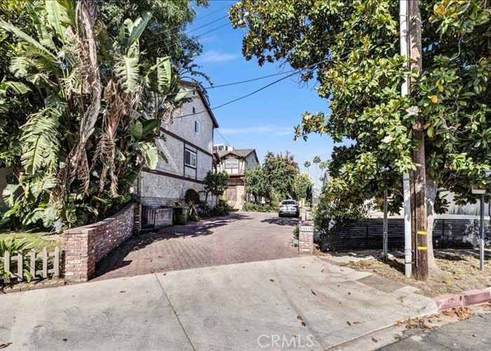 **Stunning Three-Story Townhouse Retreat in Encino, CA 91436** Welcome to your dream home! The property at 15610 Moorpark St Unit 2, Encino, CA 91436 is a stylish and spacious townhouse located in a charming, tucked-away 7-unit complex. Nestled in the heart of the prestigious Encino neighborhood, this exquisite three-story townhouse offers a perfect blend of luxury, comfort, and convenience. Boasting three spacious bedrooms and 2.5 elegantly appointed bathrooms, this residence is designed for both relaxation and entertaining. As you step inside, you'll be greeted by a light-filled open-concept living space that flows seamlessly from room to room. The living room is elegant with a marble-hearth fireplace, recessed lighting, and access to a rear balcony and patio. The gourmet kitchen features modern appliances, sleek countertops, and ample cabinetry—ideal for culinary enthusiasts. Adjacent to the kitchen is a generous dining area that beckons gatherings with family and friends. Venture up to the second level where tranquility awaits in the primary suite. Estate-sized with vaulted beamed ceilings, a romantic fireplace, two large walk-in closets, and a luxurious spa-style bathroom (spa tub, oversized shower, dual vanity). Additional bedrooms. One upstairs with a private ¾ bath; the third bedroom is a convertible den adjacent to the living room, also with a ¾ bath. Two additional well-sized bedrooms provide versatility for guests or can be transformed into dedicated home offices or creative spaces. Full size laundry area is also available. Step outside onto your private balcony—the perfect spot to sip your morning coffee or unwind with an evening glass of wine. Private 2 car garage attached. The common area includes a pool and a lawn area. Walking distance to many dinning options in the area.