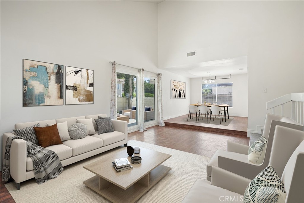 Welcome to this generous two-story residence on a coveted corner lot in Woodland Hills. Offering 4 bedrooms and 3 bathrooms, this home provides an abundance of living space in a quiet, well-established neighborhood. The main level features both a formal living room and a cozy family room with a fireplace, plus a formal dining room and a breakfast area in the kitchen—perfect for both casual mornings and special gatherings. Upstairs, you’ll find all four bedrooms, including two with walk-in closets. Enjoy the convenience of a dedicated laundry room and direct access to the two-car garage. Outside, the private backyard is made for Valley living—host friends on the covered patio or take a refreshing dip in the pool during warm summer days. This home offers a comfortable layout and the opportunity to add your own personal touches. With an unbeatable proximity to schools, freeways, restaurants, and local golf courses, it’s a wonderful place to call home. *A couple of the photos have been digitally staged.*