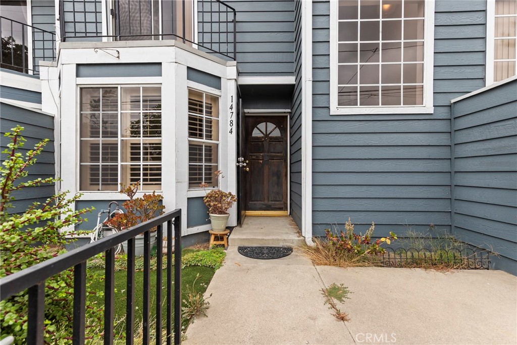 Welcome to 14784 Pioneer Blvd – a well-maintained townhome in the heart of Norwalk. This spacious 2-bedroom, 2.5-bath home offers 1,164 sq ft of comfortable living in the secure, gated Wingate Townhomes community.
Inside, you’ll find an open-concept layout with a functional kitchen, ample cabinet space, and a spacious living and dining area. The home also features a private front patio—perfect for relaxing or enjoying your morning coffee.
Upstairs, both bedrooms have vaulted ceilings and private ensuite bathrooms. The primary suite includes its own balcony, and there is a dedicated laundry area located on the second floor. Central heating and air conditioning provide comfort throughout the year.
An attached 2-car garage offers direct access to the home along with added storage space. Community amenities include a pool, spa, and controlled access for peace of mind.
Conveniently located near local shopping, dining, schools, and freeway access, this home offers a practical and comfortable lifestyle in a sought-after neighborhood.