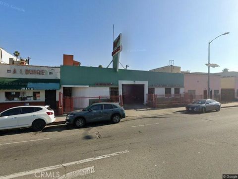 Photo of 2909 W Vernon Avenue, Los Angeles, CA 90008 (MLS # GD26000669)