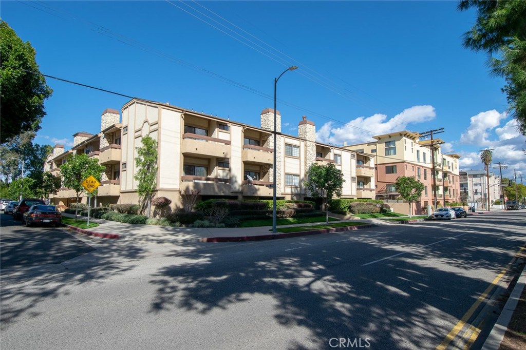 Light and bright Valley Village location, corner top floor condo unit of 2 bdrms, 2 bths, freshly painted, newer flooring in living room and bedrooms, refreshed bathrooms and kitchen. Luxury bonus: newer central vacuum!. Spacious living room with high ceilings and cozy gas burning fireplace, refreshed kitchen opens to the living space with a breakfast bar, newer appliances, recessed and pendant lights. Open floor plan concept with large dining area opening to the living room and kitchen. Main suite offers voluminous ceilings, door to the large balcony is fitted with shutters, walk in closet, full bathroom with dual sinks vanity, soaking tub and separate shower. Spacious junior bedroom has a large closet, is bright and shares the hallway updated full bathroom. Smooth ceilings, window treatments and inside stackable W&D. Tandem 2 car parking with shelved storage unit. Move in ready, a great place to call home! A FICO 650+, and advance appointment required. Complex entry is at 5410 Rhodes.