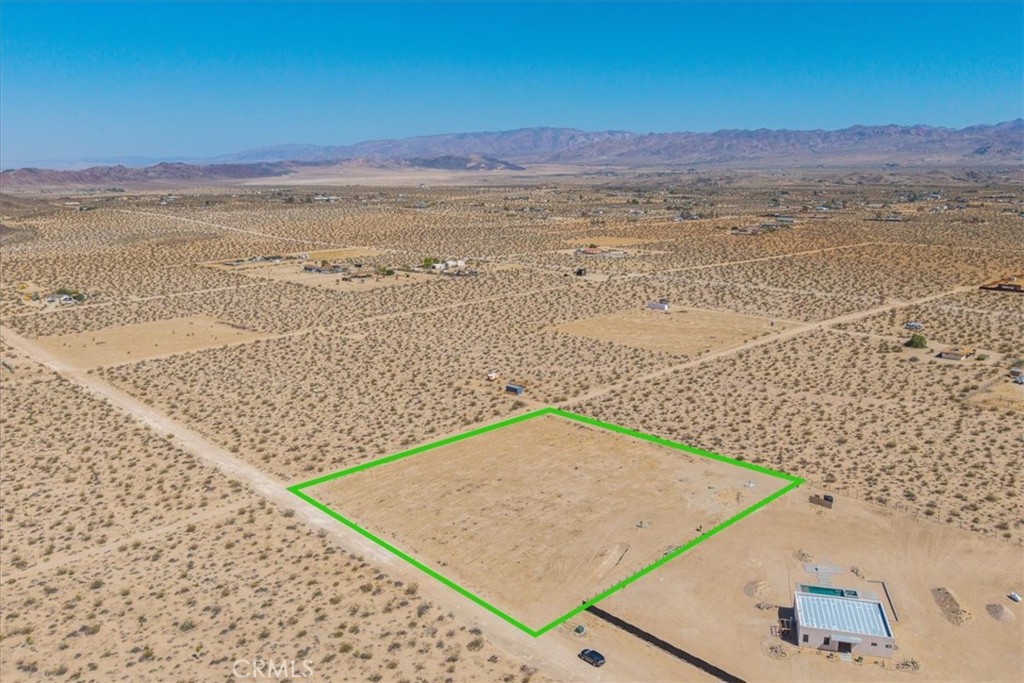 Attention builders and developers! This 2.07-acre parcel in the heart of Joshua Tree is a rare opportunity to bring your vision to life. With a Well already dug and electricity conveniently located at the corner of the property, much of the groundwork has already been done—making this the perfect canvas for your custom home or investment project.
Nestled next to a striking architectural gem, this parcel offers not just potential, but prestige. Whether you’re dreaming of a desert retreat or planning your next development, this lot offers inspiring mountain views, vast open skies, and the peace and privacy that make Joshua Tree so sought after.
Located just minutes from Joshua Tree National Park and a stone’s throw from the artistic community of Landers, you'll enjoy easy access to hiking, stargazing, and local culture.
Don't miss this chance to own a build-ready slice of the high desert—bring your vision and make it a reality.
