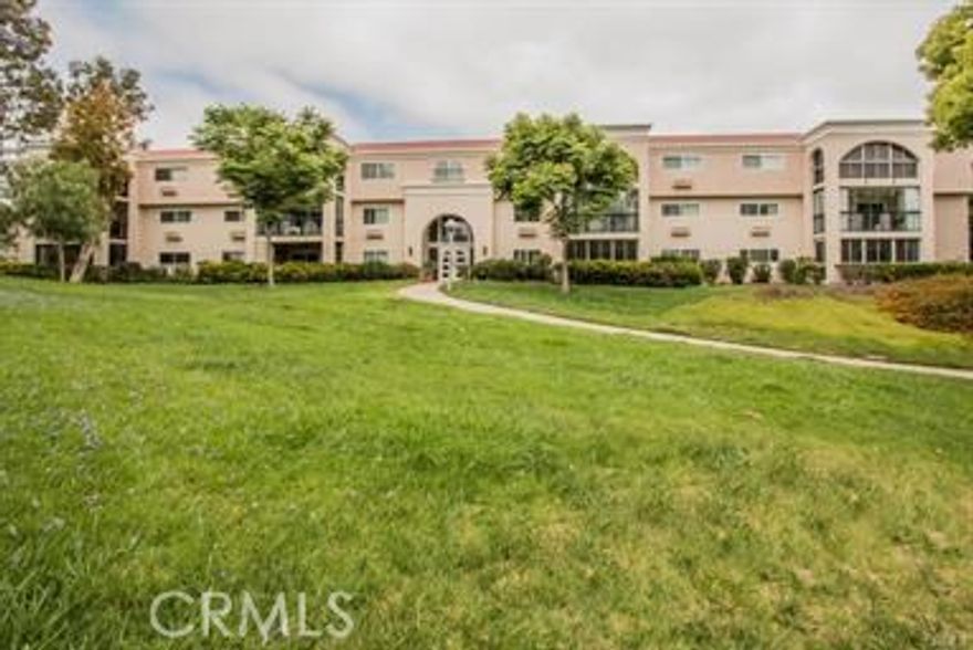 This Beautiful "EL MIRADOR" with a fabulous outlook of a greenbelt. Double door Entry. The kitchen has designer cabinets with an island work and eating area. Marble flooring in kitchen and bath, Wood flooring in living room and bedroom, Double pane windows & Sliding door and Crown molding. Both baths have been remodeled as well. Enjoy all the wonderful amenities that Laguna Woods 55+ senior community has to offer, 5 Pools, 7 Clubhouses, 27 hole Golf Course, Par 3 Golf, Library, 2 Fitness centers and much more ….. only minutes from famous Laguna Beach.