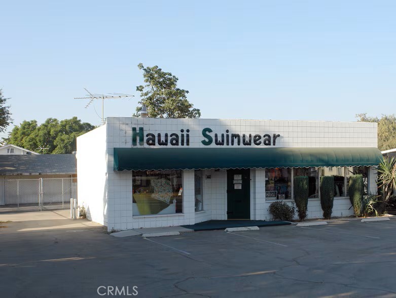 Great Location with frontage on Van Buren Blvd, near the 91 FWY. In addition to the existing building, there is ample business parking in the front and a two-car garage in the back. The building is easily accessible from Van Buren Blvd or the back alley. The property is also available for lease.