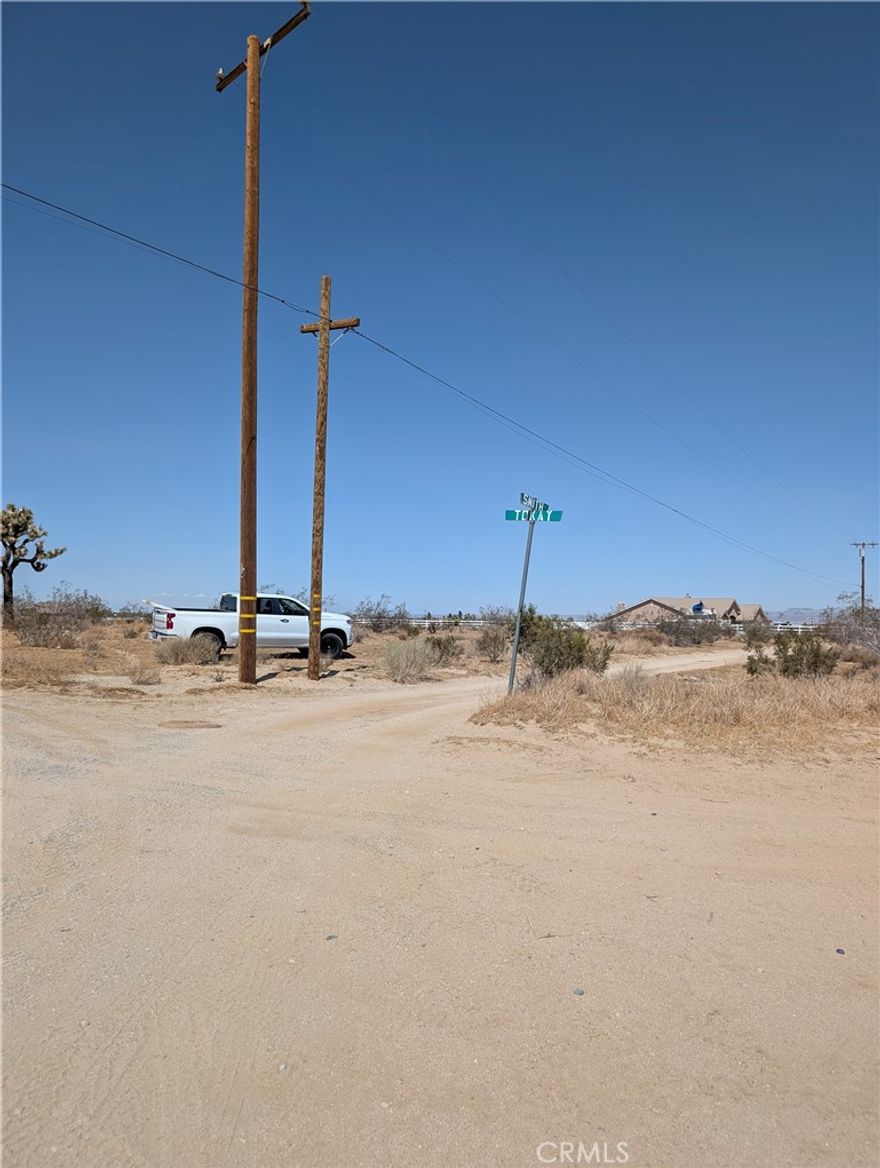 Here is a Beautiful 2.3 acre Corner lot, Flat/level & ready to Build your mini Ranchito! Enjoy the Tranquility of the Rural Desert Living with Victor Valley Amenities not far away. The subject property can be seen from Duncan Road, Surrounded by Custom Homes on each side, no Physical address has been assigned to this lot, but Neighbor 12176 Smith Road can be used as reference only. Hurry at this Perfect Opportunity!!