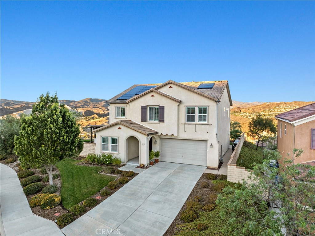 Welcome to this stunning 4-bedroom + loft, 3-bathroom Plum Canyon home, offering 2,371 sq ft of beautifully designed living space on a premium cul-de-sac lot with JAW DROPPING VIEWS from sunrise to sunset and owned solar! Step inside to find a full bedroom and bathroom on the main level, perfect for guests or multi-generational living. The gourmet kitchen boasts granite countertops, upgraded appliances including a Viking stove, a spacious breakfast bar, and sleek cabinetry with abundant storage—all opening seamlessly to the dining and living areas, where you’ll enjoy panoramic views from every window. Upstairs, you’ll find two additional well-appointed bedrooms, including a spacious primary suite with breathtaking views, a spa-inspired ensuite with soaking tub, separate shower, and large walk-in closet. The versatile loft—also with amazing views—offers the ideal space for a home office, gym, or playroom, while the upstairs laundry room adds everyday convenience. Step outside to your beautifully landscaped yard, complete with covered patio, pergola-covered spa, and plenty of space for outdoor entertaining—all with unobstructed views of Santa Clarita Valley. With energy-efficient owned solar, this turn-key home is as smart as it is stunning. Located in one of Santa Clarita’s most desirable neighborhoods, close to top-rated schools, parks, shopping, and dining. Don’t miss your chance to make this your NEXT HOME!