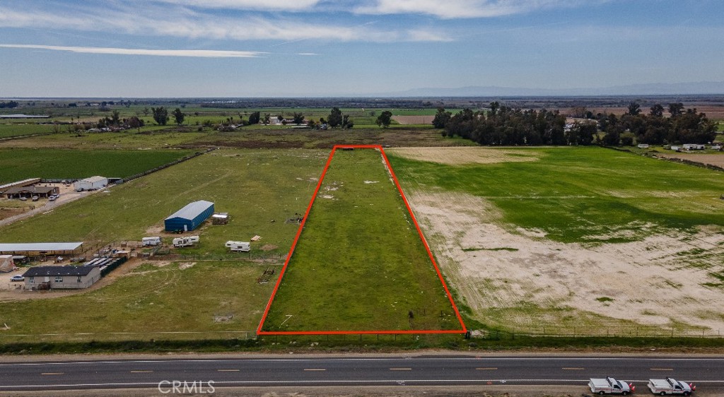 Prime 4.8-Acre Parcel with Highway Frontage in Stevinson Discover an exceptional opportunity with this 4.8-acre land parcel located along Hwy 140 in Stevinson. Zoned A-1, the property offers versatile potential whether you envision it as a future residential site, agricultural use, or investment property. With high-visibility highway frontage, this lot is ideal for those seeking easy access and exposure. Currently leased for $2,800/month, this parcel provides immediate income while you plan your future use. Its location offers a balance of rural charm and convenience, with quick access to nearby towns and services. Don't miss the chance to own this multi-use property with income potential and endless possibilities..