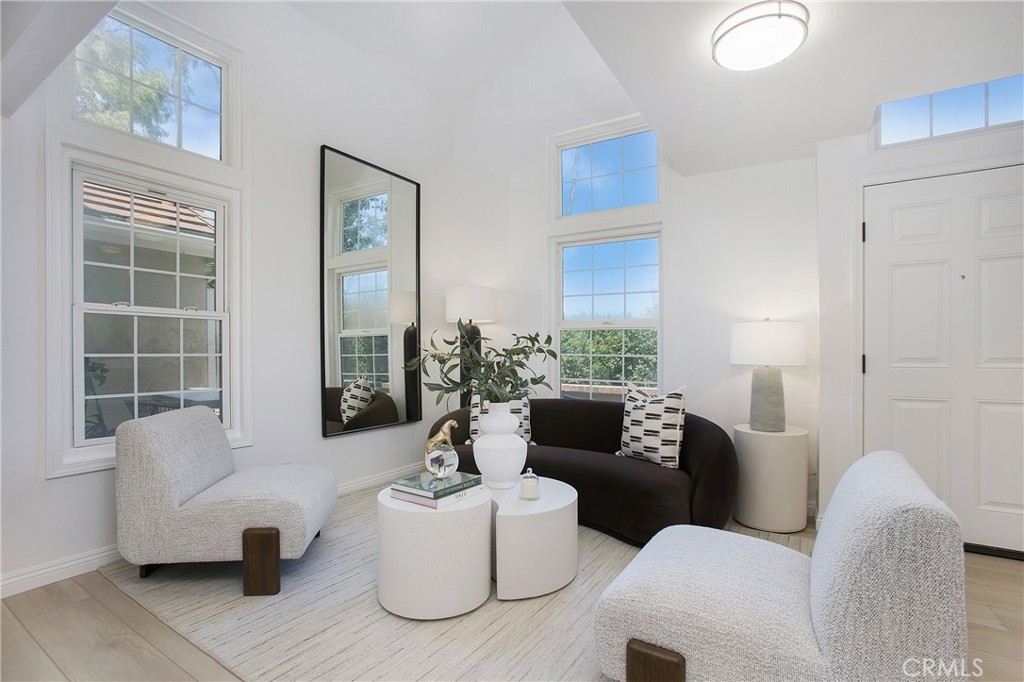 A RARE opportunity to own the only 4-Bedroom + Bonus Room condo in the highly desirable University Town Center area. No other property in this neighborhood offers this layout, making it truly One-of-a-Kind. Ideally located in the top-ranked Irvine Unified School District (IUSD), this renovated home is surrounded by some of Irvine’s best-performing schools for families who care about education—all within walking or biking distance. Just across the street is University High School, consistently ranked among the top 3 high schools in Irvine and a recipient of the National Blue Ribbon & California Gold Ribbon School Awards. Turtle Rock Elementary, also ranked in Irvine’s top 3 elementary schools, is a short walk away & Rancho San Joaquin Middle School, another top performing school is nearby. IUSD school bus service is available to this address—a RARE advantage not offered to all residents. UC Irvine is just ¼ mile away & Concordia is only 2.5 miles down the road, offering strong appeal to families, faculty, or investors. Both the current & previous owners rented rooms to students, generating above-average rental income. This updated 2-story private end unit lives like a single-family home. The flexible floorplan includes 2 upstairs en-suite bedrooms, 2 downstairs bedrooms & 3 full baths. Upstairs bonus room w/built-in wardrobe cabinets provides additional flex space. Attached 2-car garage offers safe direct access, built-in storage & closets, attic space & laundry area. Large interior storage closet beneath the stairs for additional storage. The open-concept kitchen features a breakfast bar w/built-in cabinetry & newer stainless appliances (including a 5-burner gas stove w/removable griddle), flows into the dining area & private enclosed patio yard—ideal for entertaining, relaxing, or pets. Soaring ceilings, skylights & fresh interior paint create a bright, airy atmosphere thru-out. Additional upgrades include wood laminate floors, Reverse Osmosis Water Filtration System, Central A/C & a Whole-house fan for energy-efficient cooling. Community amenities include 2 pools/spas, tennis & basketball courts & playgrounds. Mason Park, a 339-acre outdoor haven with lakes, hiking/biking trails & an amphitheater is located across from the community. Whether searching for a primary residence in a premier school district or a high-demand investment opportunity, this home delivers exceptional value. Homes like this are rarely available—and when they are, they don’t last.