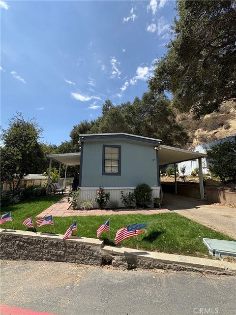 Photo of 23500 The Old Road Rd #37, Newhall, CA 91321 (MLS # SR26138469)