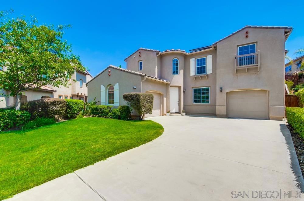 Welcome to 425 Camino Hermoso – a beautifully updated home located in the gated community of Belleza in San Marcos. This 3-bedroom, 3.5-bath home offers a bright, open floor plan with travertine and hardwood flooring throughout. The spacious living area features recessed lighting and a cozy fireplace that flows seamlessly into the dining area and modern kitchen. The kitchen is equipped with stainless steel appliances, granite countertops, a large center island, and ample cabinetry for storage. Upstairs, you'll find a generous primary suite with a walk-in closet and an ensuite bath featuring dual sinks, a soaking tub, and a separate shower. Two additional bedrooms share a well-appointed hall bathroom, and a versatile loft area provides space for a home office, playroom, or media room. The private backyard is perfect for entertaining with a paved patio, lush landscaping, and no neighbors directly behind. Additional highlights include central A/C, an upstairs laundry room, and an attached 2-car garage. Enjoy low HOA dues, a family-friendly neighborhood, and close proximity to top-rated schools, parks, trails, CSUSM, and all that San Marcos has to offer.