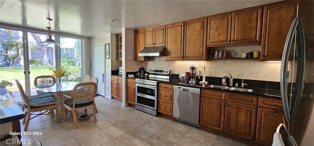 Photo of 16433 Wimbledon LN, Huntington Beach, CA 92649 (MLS # OC26201009)