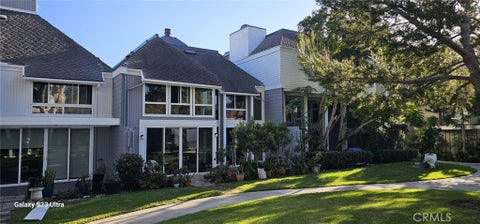 Photo of 16433 Wimbledon LN, Huntington Beach, CA 92649 (MLS # OC26201009)