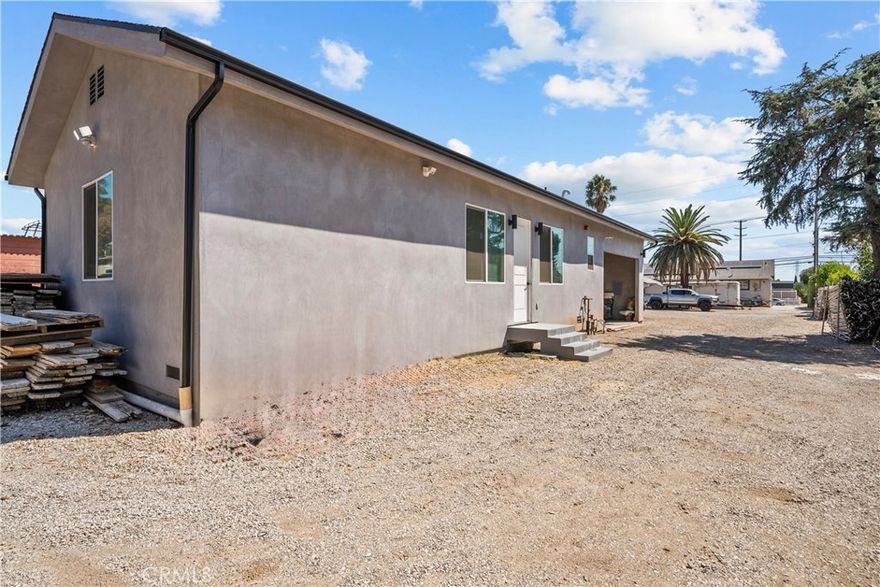 Just listed for lease, this brand new construction ADU offers 2 bedrooms, 1 bathroom, and approximately 900 square feet of modern living space. Located on a private and gated property, the home features an open floor plan with high ceilings, recessed lighting, new flooring, and a finished kitchen with granite countertops and opened to the living room area. The bathroom includes a stylish walk-in shower, and the unit is equipped with central heating and air for year round comfort. The property also comes with solar panels, helping keep electricity costs very low. Additional amenities include washer and dryer hookups, a private entrance, and carport parking on the property. This is the perfect opportunity to enjoy the privacy of a newly built home while still being conveniently close to freeways, shopping, and local amenities.