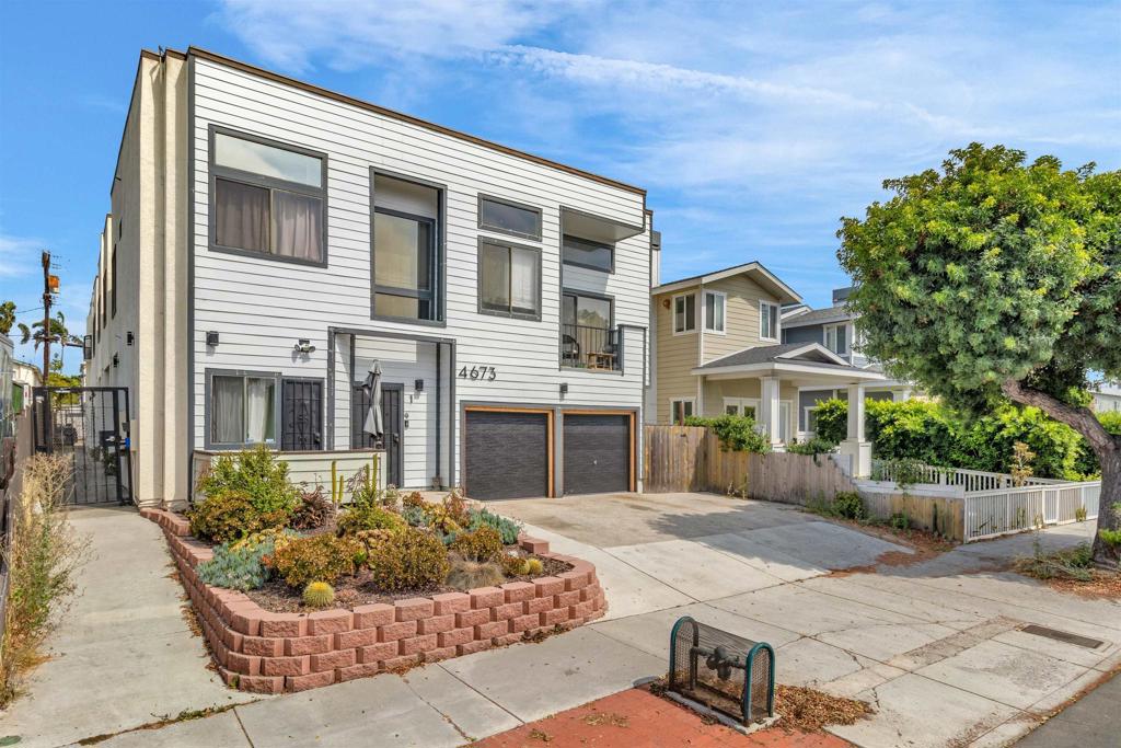 Discover this beautifully updated condo situated in a secure gated community in the highly sought-after University Heights neighborhood. Step inside to an inviting open-concept layout featuring luxury vinyl plank flooring, recessed lighting, and a cozy fireplace perfect for relaxing evenings. The modern kitchen is a chef’s dream with quartz countertops, shaker cabinets, stainless steel appliances, and a designer herringbone tile backsplash. Enjoy your own private patio for morning coffee or evening gatherings, plus the convenience of in-unit laundry and an attached garage. The spacious bedroom offers abundant natural light, and the bathroom boasts contemporary finishes. Perfectly located near trendy cafes, restaurants, and shops, with easy freeway access for a quick commute. Whether you’re a first-time buyer or looking to invest in a low-maintenance property, this home offers the ideal blend of style, comfort, and location.
