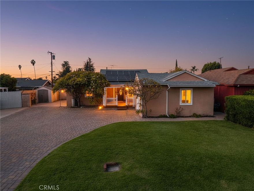 THIS HOME IS A MUST SEE! Beautiful, SINGLE-STORY home that features a bright and open floorplan with 3 bedrooms, 2 bathrooms with 1,539 square feet of spacious living space. You are welcomed at the entry into the spacious living room which features beautiful front windows which provide plenty of natural lighting and is adjacent to the large formal dining room. The kitchen includes plenty of cabinets for storage, gas range with overhead microwave, and it opens to the dining room.  The spacious family room features a cozy fireplace, access to the enclosed patio and overlooks the living room/dining room which makes it great for entertaining. The Primary Bedroom Suite is off the family room and features a LARGE bedroom area, walk-in closet and beautiful ensuite bathroom. At the front of the house, there are two additional bedrooms which offer plenty of closet space, and a beautiful hall bathroom that includes a large walk-in tub. Additional features of the home include 1 car garage with extended driveway, RV Parking, Solar Panels to save on your electricity bill and NO HOA. This home is located just a few minutes away from entertainment, restaurants, shopping and has easy freeway access. This home is one you won’t want to miss!