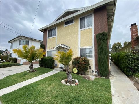 Photo of 12327 Beverly BLVD #C3, Whittier, CA 90601 (MLS # WS26126965)