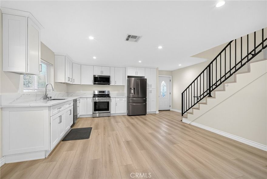 Tucked away in one of Calabasas’ most peaceful neighborhoods, this two-story, 2-bedroom, 1.5-bathroom ADU combines modern design with everyday comfort with all utilities and high-speed internet included. Featuring light, wood-like luxury vinyl flooring & LED recessed lighting throughout. The inviting open concept living area is filled with natural light streaming through dual-pane windows, creating an airy and welcoming atmosphere. The open kitchen is a true highlight, featuring marble-like quartz countertops, custom cabinetry that maximizes storage, and sleek appliances that include range/stove, dishwasher, microwave, and refrigerator. Upstairs, both bedrooms are generously sized with custom closets, while a chic jack-and-jill ¾ bathroom conveniently services both bedrooms. Additional amenities include a private laundry room with newer washer and dryer, and central air and heating for year-round comfort. Outdoor lovers will appreciate the nearby hiking trails, while commuters will enjoy quick access to the 101 freeway for an easy drive into Los Angeles or Malibu. Families will also benefit from the highly acclaimed Las Virgenes School District. Offering privacy, style, and an excellent location, this is a rare opportunity to secure a beautiful home in Calabasas.