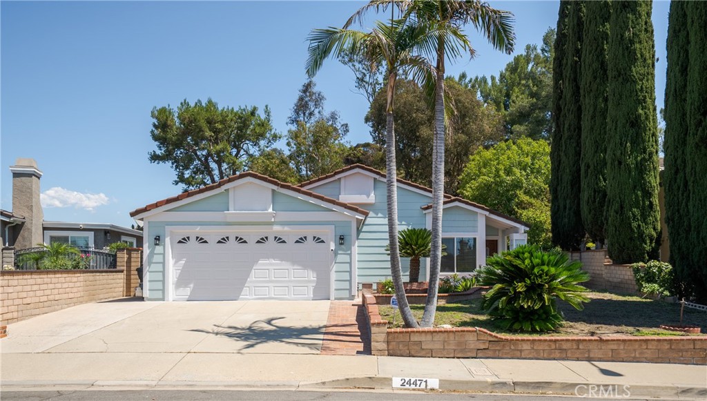 Welcome to 24471 Rockbury Drive in Diamond Bar! This beautifully updated 3 bedroom, 2 bath single-story home sits on a generous lot in a quiet, desirable neighborhood just minutes from Pantera Park. Step inside to discover a bright and open layout with high vaulted ceilings in the living room, creating an airy and inviting atmosphere. A cozy separate family room offers the perfect spot to relax or entertain. The home has been thoughtfully upgraded with fresh interior and exterior paint, brand new dual-pane windows, and a fully remodeled kitchen featuring modern cabinets and sleek countertops. Enjoy the outdoors with well-maintained landscaping that provides both beauty and privacy. Additional highlights include a 2-car attached garage and close proximity to the award winning Pantera Elementary School make this property truly special. Move-in ready and designed for comfort, this home is a rare find you won’t want to miss!