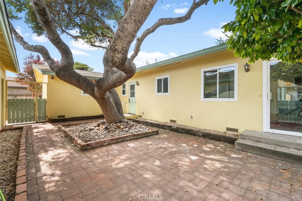 Welcome to this bright and cheerful 3 bedroom, 2 bath home, offering 1,309 sq. ft. of comfortable living space in the highly sought-after Cuesta by the Sea neighborhood. Situated on a large 8,000 sq. ft. double corner lot just blocks from the bay, this property combines tranquility, charm, and coastal convenience.
On the market for the first time in over two decades, the single level home features new laminate flooring, fresh interior paint, and updated windows and sliding doors that fill the space with natural light. The inviting living room centers around a cozy wood-burning fireplace with a classic brick surround, while the bright kitchen with a brand-new stove opens seamlessly to the dining area for easy entertaining.
Step outside to discover a private courtyard shaded by a majestic oak tree, along with a spacious backyard that serves as a blank canvas for your landscaping vision. Additional highlights include a large back shed that is perfect for a home office or artist studio, a smaller garden shed, and a detached two-car garage with adjacent RV parking and hookups.
The location is unbeatable: just a few blocks from the bay, with Sweet Springs Nature Preserve, Montaña de Oro State Park, golf, shopping, and charming Baywood all nearby. Even better, the street ends at open space with gorgeous walking trails right at your doorstep.
This is a rare opportunity to own a property with incredible potential in one of the Central Coast’s most desirable coastal communities.