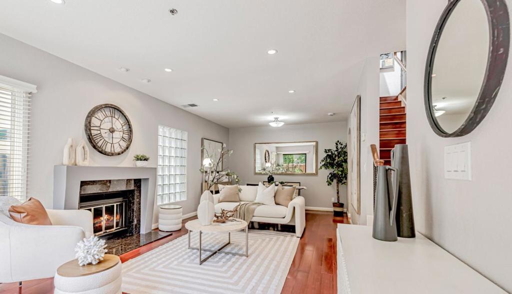URBAN LIVING AT ITS BEST | just a few short blocks of tree-lined streets to downtown Palo Alto University Avenue, this pristine 2-story townhouse (approx.1580 sf) with attached 2-car garage (approx. 360 sf) is well positioned at the back of a 10-unit, professionally managed boutique complex | front courtyard through a private wooden gate, numerous exclusive-use outdoor spaces | tastefully remodeled kitchen has sleek white cabinets by Martha Stewart Living kitchen collection, under cabinet lighting, breakfast bar and everyday eat-in area opening out to the front courtyard | mostly wood floor, heat pump (2010) for central heating & A/C (2 zones), double paned windows & sliding glass doors, skylights and recessed lights | remodeled full bathrooms both with double vanity sinks; primary has openable skylight & oversized shower with Grohe fixture | all 3 bedrooms on the 2nd floor have vaulted ceilings and access to balconies for private enjoyment; primary suite has walk-in closet | 2nd floor laundry closet with side-by-side washer & dryer included, 1st floor guest powder room has pedestal vanity sink | Downtown Palo Alto offers a college town scene and Silicon Valley Hi-tech vibe with bike lanes/paths, neighborhood parks, sidewalk cafes & some of the best fine dining in the Bay Area