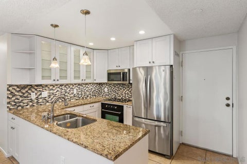 Photo of 8308 Regents Rd RD #1O, San Diego, CA 92122 (MLS # 260024249SD)
