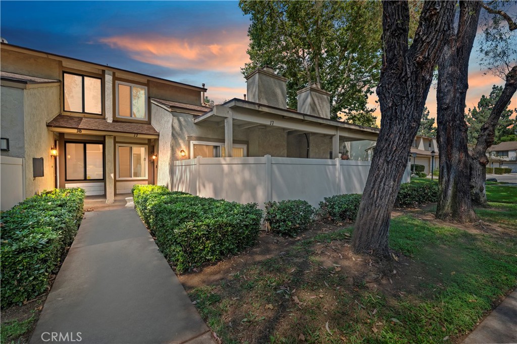 Discover turnkey comfort in this beautifully updated 2-bed, 2.5-bath condo in the sought-after Park Vista community. Built in 1983 with 1,107 sq ft of thoughtfully designed living space, this home has been tastefully upgraded from top to bottom, making it truly move-in ready.
Step inside to find fresh white paint throughout, smooth ceilings (no popcorn here), and stunning new flooring that flows seamlessly through the home. The kitchen boasts soft-close cabinets, crown molding accents, recessed lighting, and updated fixtures — perfect for both everyday cooking and entertaining. Additional updates include modern ceiling fans, upgraded lighting in the entry and stairway, refreshed vanity fixtures, and freshly stained cabinetry in multiple bathrooms.
The spacious family room features a cozy fireplace and opens to a private patio with views of lush greenbelts. Upstairs, both bedrooms feature attached bathrooms. The primary suite offers a walk-in closet and full bath, while the secondary bedroom includes a shower and standard closet — ideal for guests, roommates, or a home office with its own private bath.
Enjoy resort-style living with HOA-maintained amenities including a sparkling pool, relaxing spa, beautifully landscaped grounds, trash service, and water. A two-car attached garage with direct access completes the package.
Conveniently located near schools, shopping, dining, and commuter routes, this home blends comfort, style, and convenience in one inviting space. Don’t miss your chance to own this upgraded gem in the heart of Ontario.