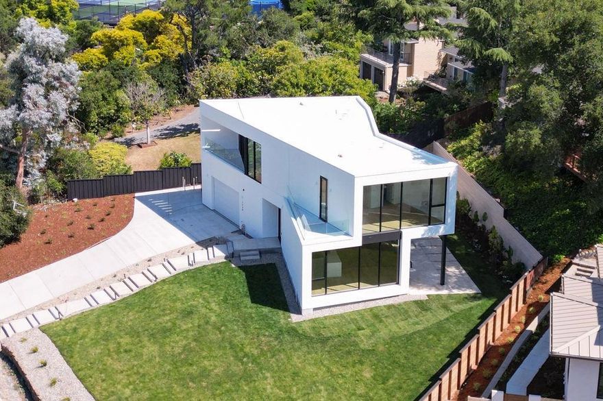 A paragon of modern architecture resting on nearly a quarter-acre of land in the sought-after Country Club enclave of Los Altos, this stunning 5-bedroom, 4-bathroom home, completed in 2023, exemplifies the hallmarks of contemporary design: an open floorplan with over 3,050 square feet of sublime living space, brimming with high-end finishes and appointments and augmented by a bright, airy ambiance. Venues ideal for both entertaining and everyday living can be found throughout, with a fireplace anchoring the living room, top-of-the-line appliances populating the chefs kitchen, a spa-like bathroom serving the impressive primary suite, and peaceful grounds on which to experience an indoor/outdoor lifestyle. Enjoy an incredible location just down the street from the Los Altos Golf & Country Club, a 5-minute drive to the Rancho Shopping Center, and within easy reach of Silicon Valley commute routes, with access to top-ranked schools (buyer to verify eligibility).