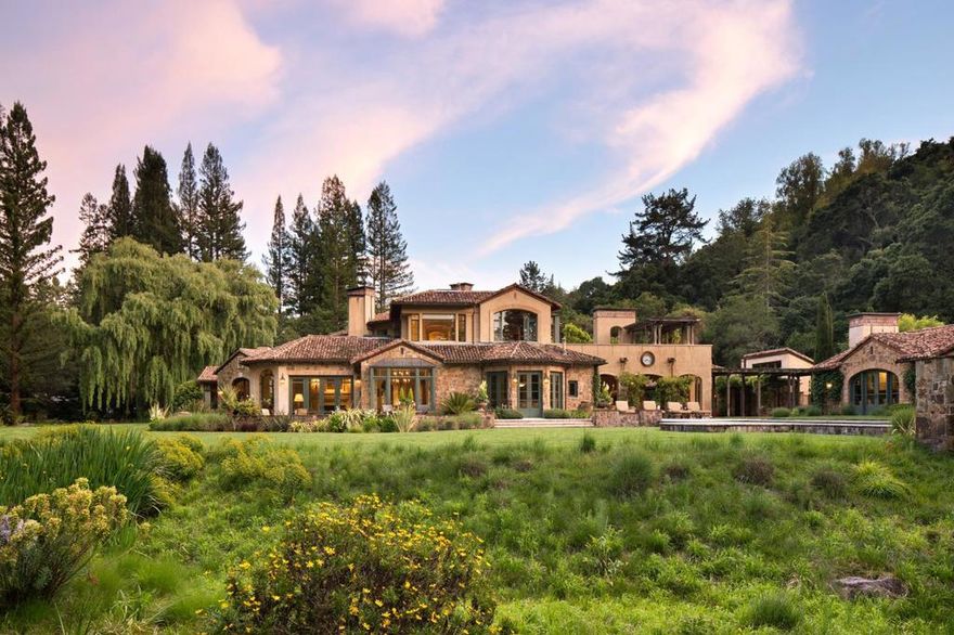 Stately Italian villa sitting on roughly 7.7 acres on one of Woodsides most sought after cul-de-sac locations is now available. Incredible attention to detail and rare, highest end, European finishes makes this home a rare treasure and true sight to behold. Venetian plaster walls, brick barrel ceiling with oak beams, herringbone terra cotta flooring, and 300-year-old terracotta roof tiles imported from Italy to name a few. Majestic park-like grounds offer the ultimate private escape. Resort like amenities include pool, hot tub, tennis court, gym, vast lawns. Have dinner under the stars in your private redwood grove with tranquil creekside setting. Incredible guest house, additional gatehouse. This is one of Woodsides finest. Highly sought after Portola Valley schools.