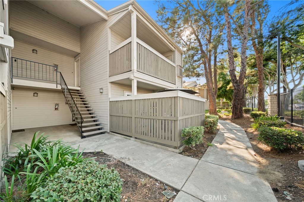 Welcome to Mission Woods Gated Community! Discover this beautifully maintained 2-bedroom, 2-bathroom upstairs condo located in the desirable Mission Woods gated community of Ontario. This turnkey residence offers a bright and spacious layout featuring a large family room, an open dining area, and a private balcony perfect for relaxing or entertaining. The updated kitchen comes complete with ample cabinet space and modern appliances, seamlessly connecting to the dining area for convenience. Both bedrooms are generously sized, with the primary suite featuring its own private bath. The unit is in move-in ready condition, offering comfort and style throughout. Residents of Mission Woods enjoy a wide array of community amenities covered by the $360 monthly HOA dues, including water, trash, fire insurance, landscaping, roof maintenance, swimming pool, tennis courts, and laundry facilities. The gated community provides added security along with beautifully maintained common areas. Situated in a convenient Ontario location, this home is close to shopping, dining, schools, and major freeways, making commuting and everyday living easy. Don’t miss your chance to own this charming condo in a prime location. Perfect for first-time buyers, downsizers, or investors!