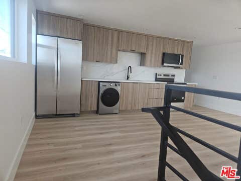 Photo of 3209 W 18th Street #4, Los Angeles, CA 90019 (MLS # 26851591)